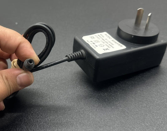 Aftermarket AC ADAPTOR BX-1202000 OUTPUT 12V 2A In Good Condition