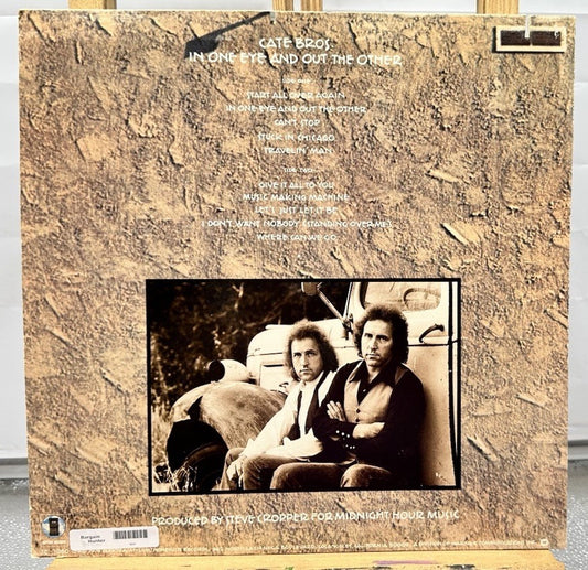 Cate Bros. - In One Eye And Out The Other Record In Good Condition 6802