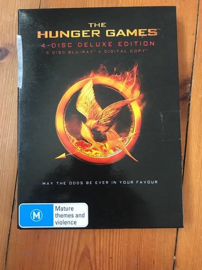 The Hunger Games 4-Disc Deluxe Edition Not Factory Sealed Blu-Ray