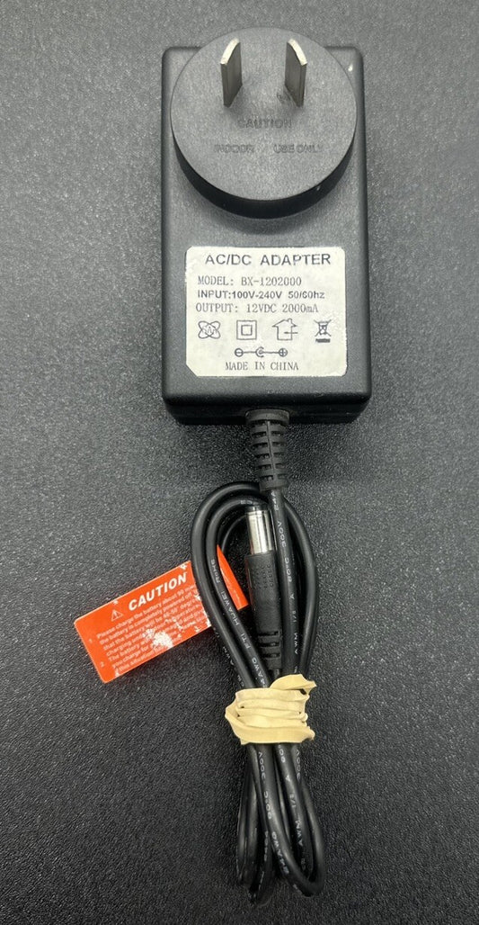 Aftermarket AC ADAPTOR BX-1202000 OUTPUT 12V 2A In Good Condition