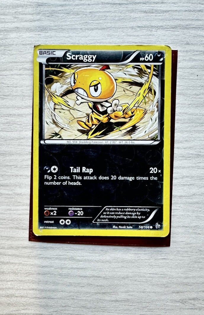 Scraggy Pokemon Reverse Holo Dark Card Year 2014 (5243)