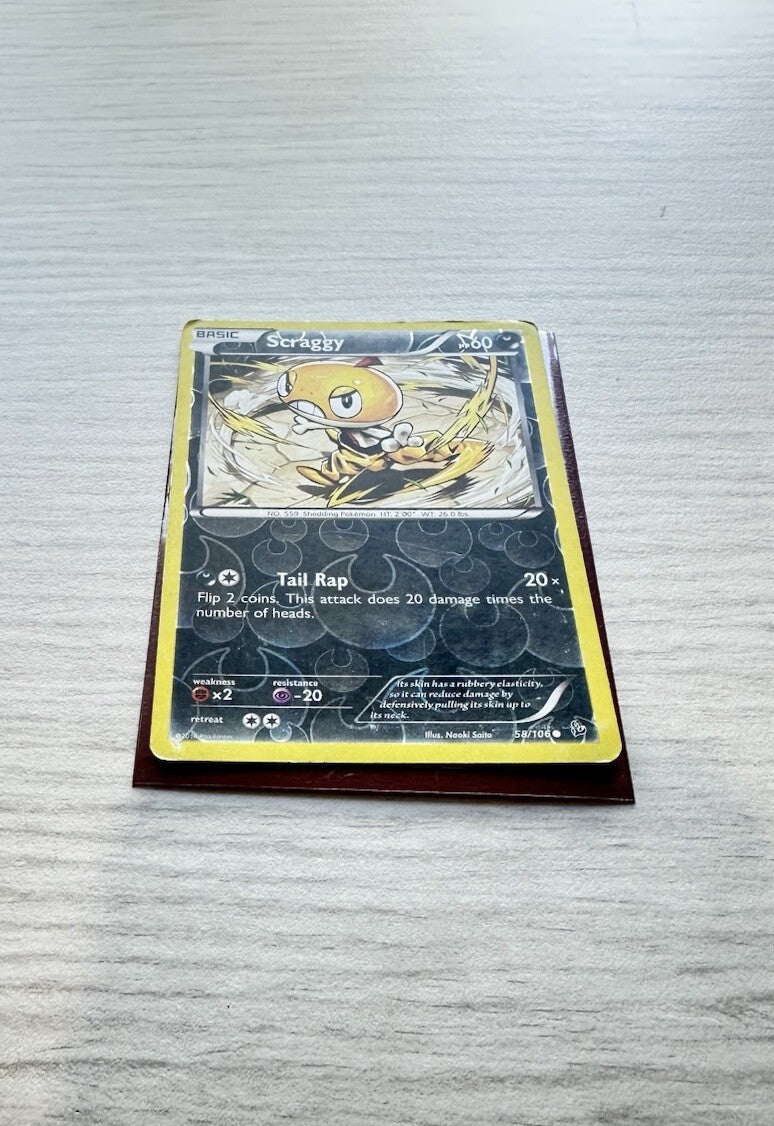 Scraggy Pokemon Reverse Holo Dark Card Year 2014 (5243)
