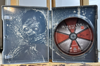 Resident Evil : Afterlife Metal Case Blu-ray - In Good Condition 4735