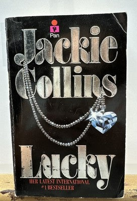 Lucky - Jackie Collins Novel In OK Condition Yellowing / Creases