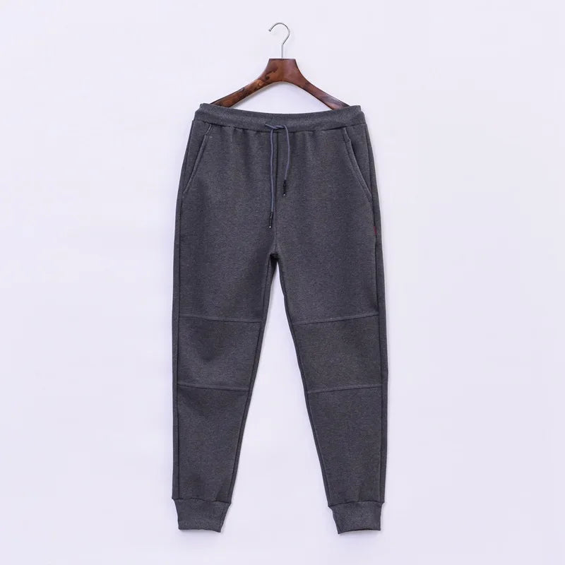 Men Big Size Solid Sweatpants Spring Elastic Narrow Feet Stretch Pants Loose Plus Size Casual Cotton Jogger Trousers 5XL 6XL 7XL