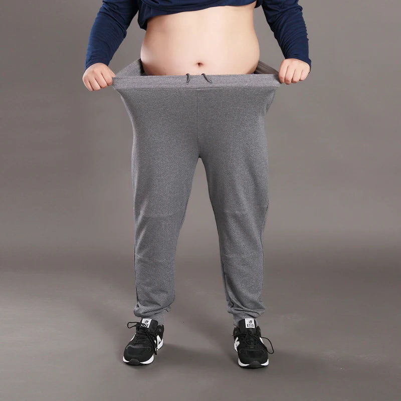 Men Big Size Solid Sweatpants Spring Elastic Narrow Feet Stretch Pants Loose Plus Size Casual Cotton Jogger Trousers 5XL 6XL 7XL