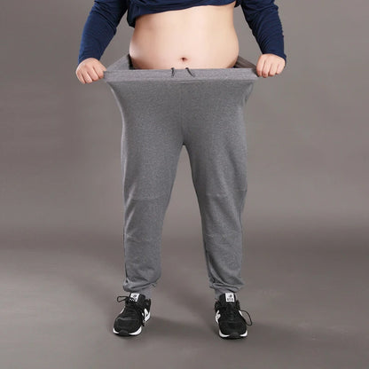 Men Big Size Solid Sweatpants Spring Elastic Narrow Feet Stretch Pants Loose Plus Size Casual Cotton Jogger Trousers 5XL 6XL 7XL
