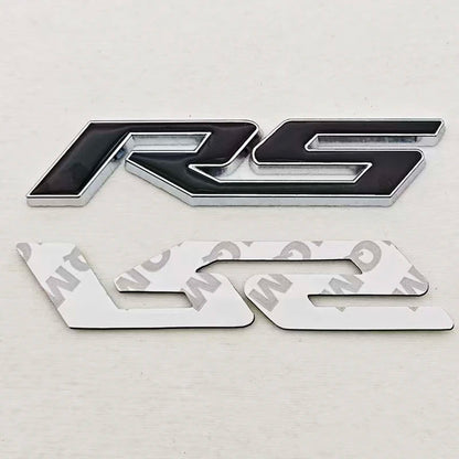 3D Metal RS Logo Sticker Front Grill Emblem Rear Trunk Badge For Chevrolet Onix Blazer lumina Camaro Cruze Monza Car Accessories