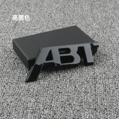 ABT-Style Gloss Black Rear Trunk Emblem - 1PCS Adhesive Badge Compatible with Audi A3/A4/A5/A6/A7/A8 & Q2/Q3/Q5/Q7 Models