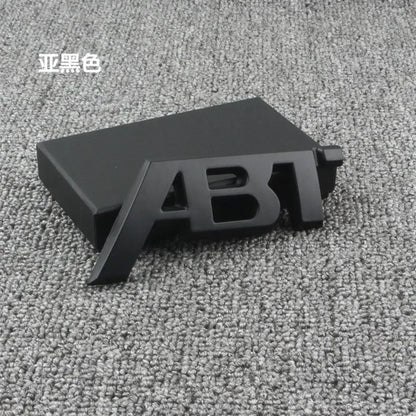 ABT-Style Gloss Black Rear Trunk Emblem - 1PCS Adhesive Badge Compatible with Audi A3/A4/A5/A6/A7/A8 & Q2/Q3/Q5/Q7 Models