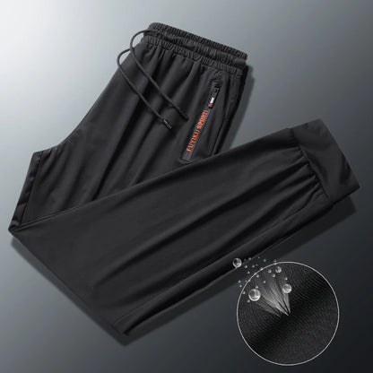 Men's Summer Ice Silk Jogger Sweatpants Zipper Pockets Breathable Running Gym Workout Athletic Mesh Pants Drawstring Design