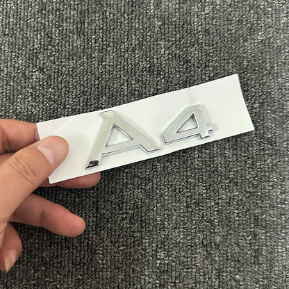 The new ABS letter 3D sticker Quattro Sline 2.0T is suitable for the modification of Audi A4 2008-2017 glossy black suitcase.