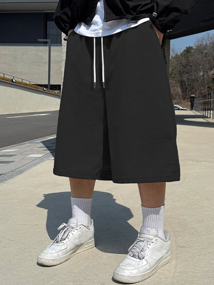 Men's Young Fashion Wide Leg Shorts Elastic Waist Casual Sweat Shorts High Street Wear Loose Fit Hip Hop Shorts