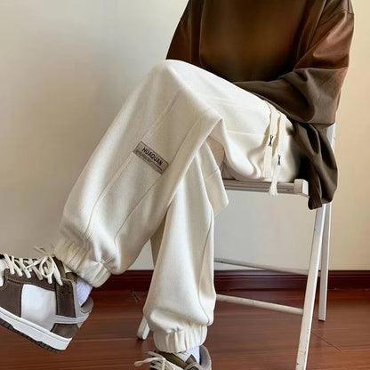 Trendy Men's Sports Joggers Thick Lined Casual Trousers Loose Fit Elastic Ankle Cuffs for Cool Weather Outfits