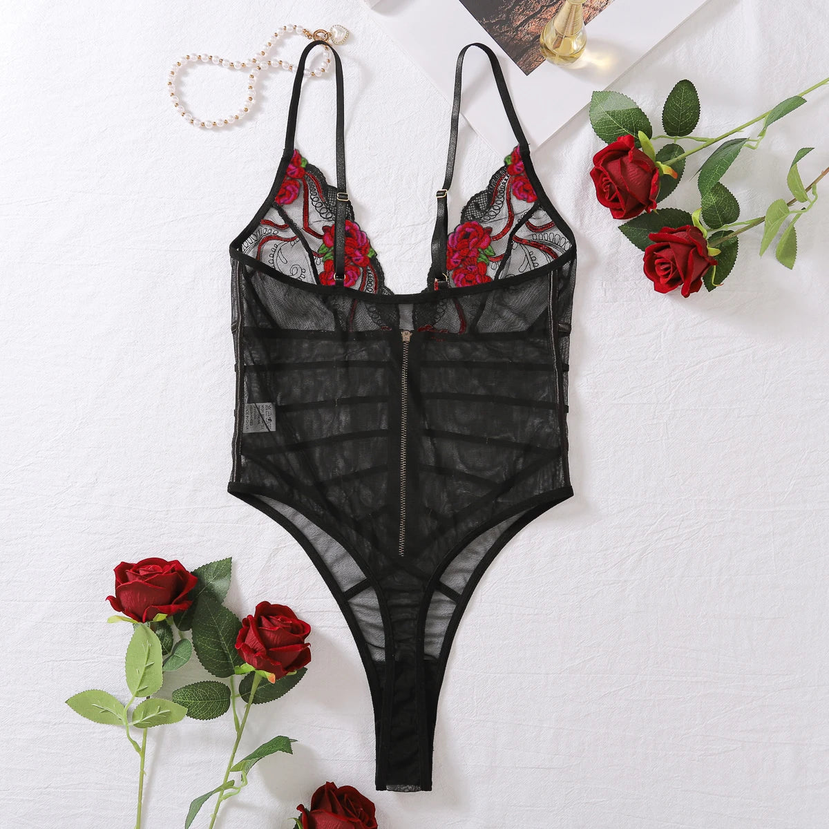 2024 New Fashionable and Sexy Lace Mesh Embroidered Transparent V-neck Mischievous Temptation Style Strap jumpsuit