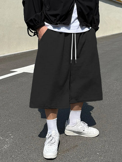 Men's Young Fashion Wide Leg Shorts Elastic Waist Casual Sweat Shorts High Street Wear Loose Fit Hip Hop Shorts