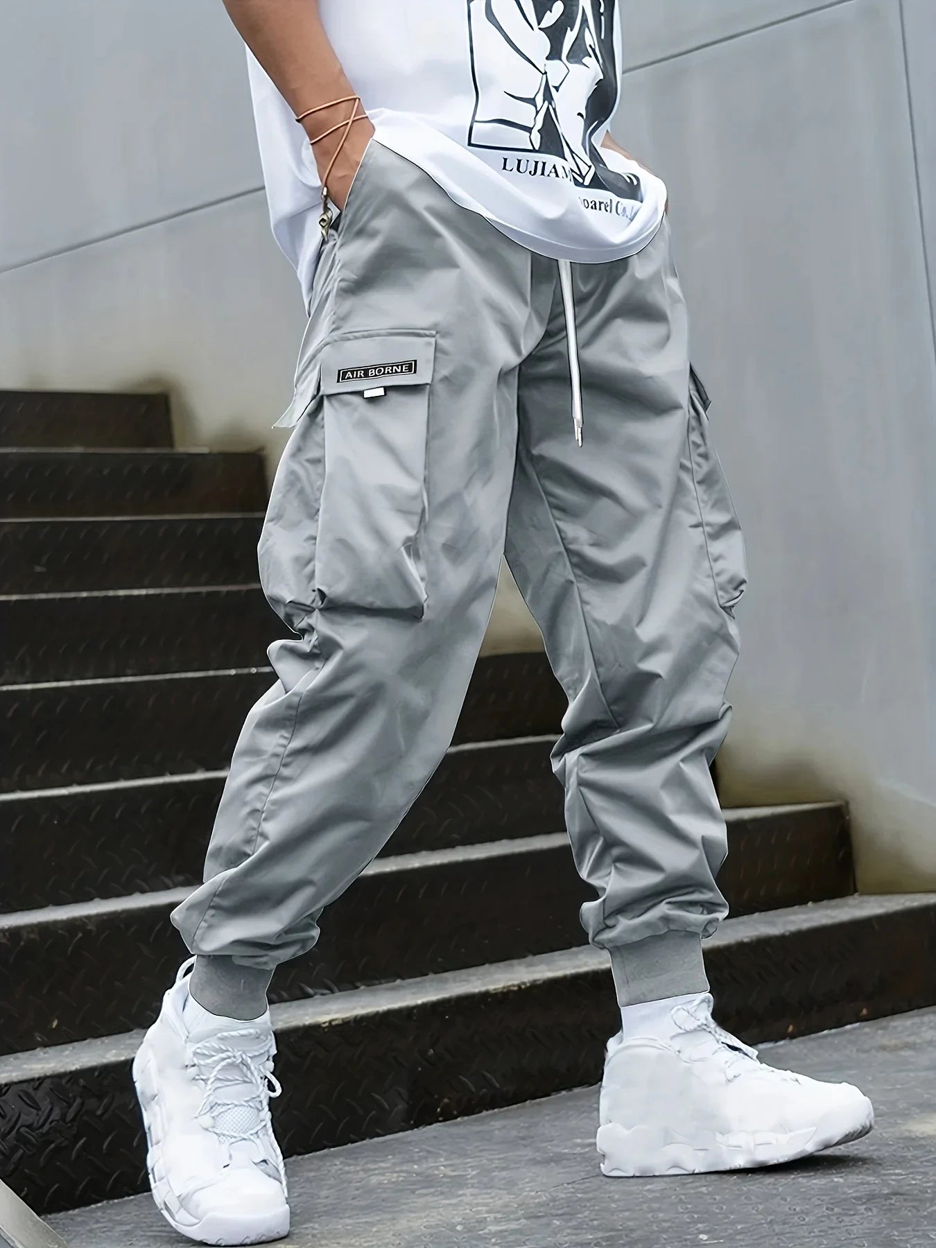 Plus Size Spring Summer Men Casual Cargo Pants Pockets Black Loose Out Door Elasticity Sports Oversize Pants 46 48 50 52
