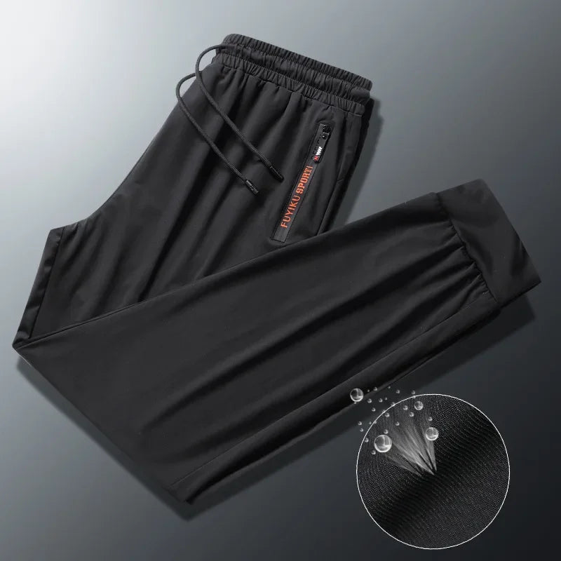 Men's Summer Ice Silk Jogger Sweatpants Zipper Pockets Breathable Running Gym Workout Athletic Mesh Pants Drawstring Design