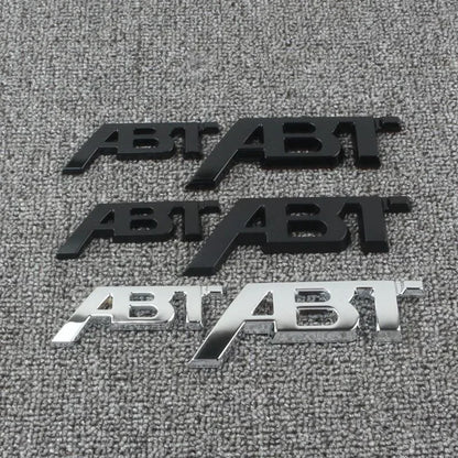 ABT-Style Gloss Black Rear Trunk Emblem - 1PCS Adhesive Badge Compatible with Audi A3/A4/A5/A6/A7/A8 & Q2/Q3/Q5/Q7 Models