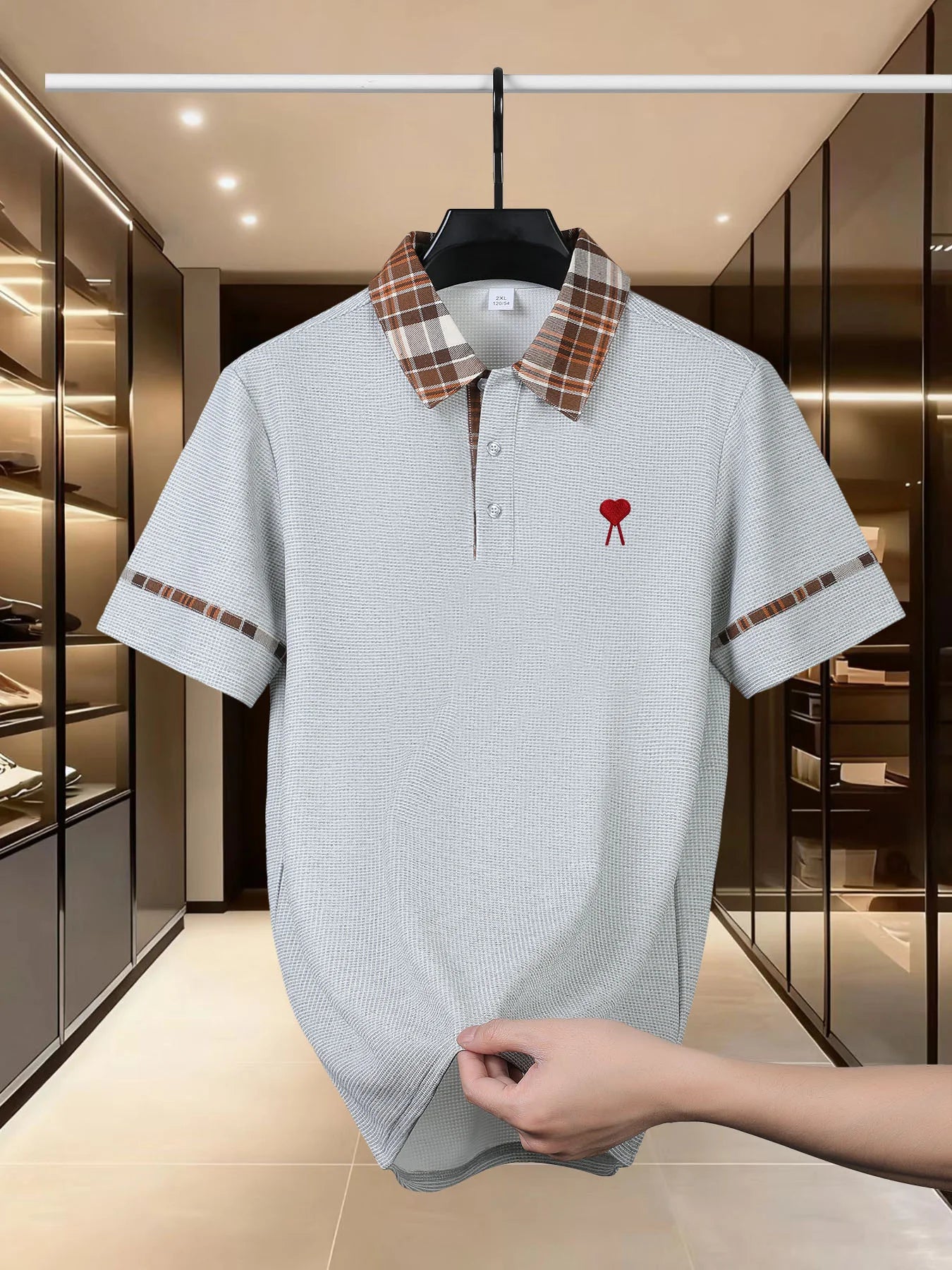 High end brand polo shirt top heart embroidery 2026 summer men's short sleeved casual and comfortable cool striped lapel T-shirt