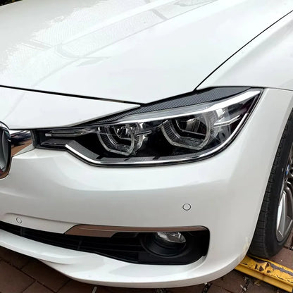 2pcs Car Headlight Eye Lid Covers ABS Carbon Headlight Lamp Eyebrows Trim Stickers for BMW 3 Series F30 F31 318i 320i 2012-2018