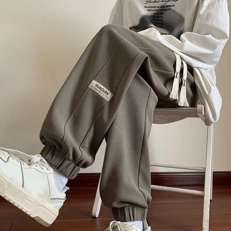 Trendy Men's Sports Joggers Thick Lined Casual Trousers Loose Fit Elastic Ankle Cuffs for Cool Weather Outfits