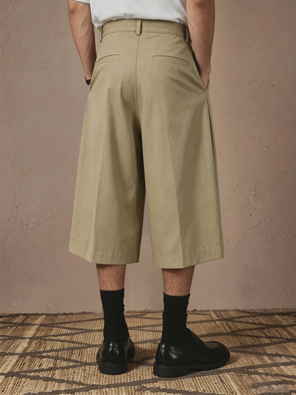 2026 SS New Arrival Men Solid Woven 7/8 Suit Pants Button Pleated Loose Straight Cropped Daily Street Trousers