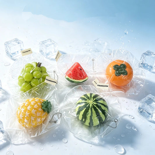 Five types of realistic fruit-shaped squeeze toys—perfect for cooling off in the summer: a watermelon slice, a whole watermelon,