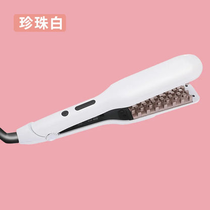 Portable home-use volumizing hair curler with negative ions for volumizing hair at the roots and creating cornrows