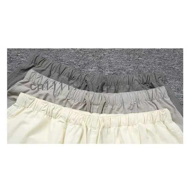 FW21 Classic Men's Nylon Shorts Fashion Design 3M Reflective Letter Shorts High Street Loose Lightweight Beach Five-point Pants