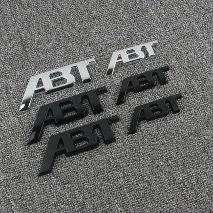 ABT-Style Gloss Black Rear Trunk Emblem - 1PCS Adhesive Badge Compatible with Audi A3/A4/A5/A6/A7/A8 & Q2/Q3/Q5/Q7 Models