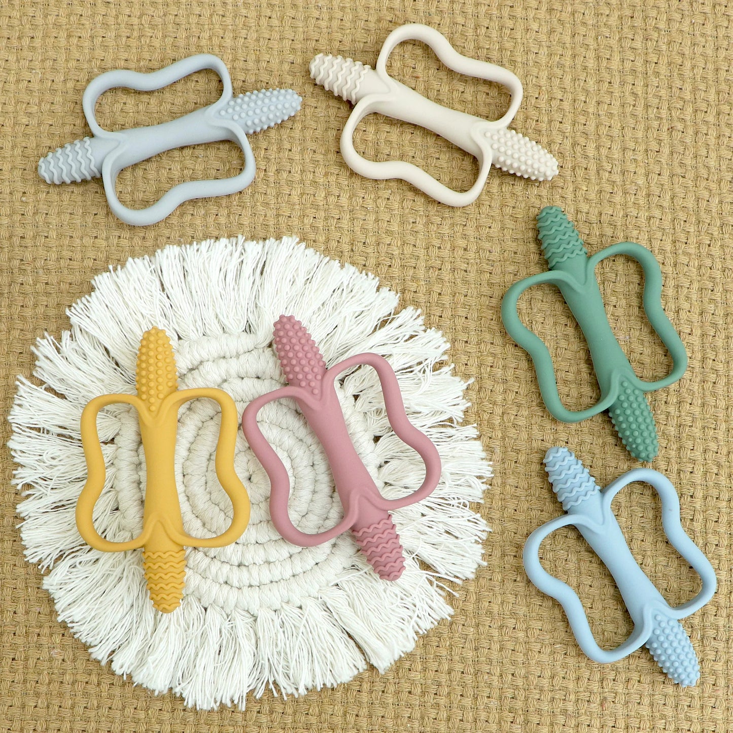 One-piece silicone teething stick with handle, baby toy teether, 6 colors, easy to grip, corn-shaped teether, BPA-free.
