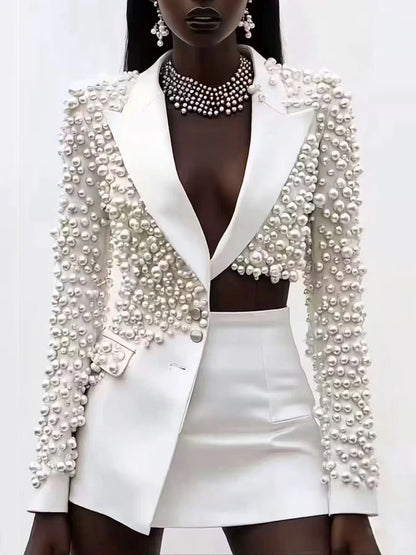 TWOTWINSTYLE Spliced Pearls Two Piece Set for Women Lapel Long Sleeve Irregular Top High Waist Mini Skirt Office Suit Female New