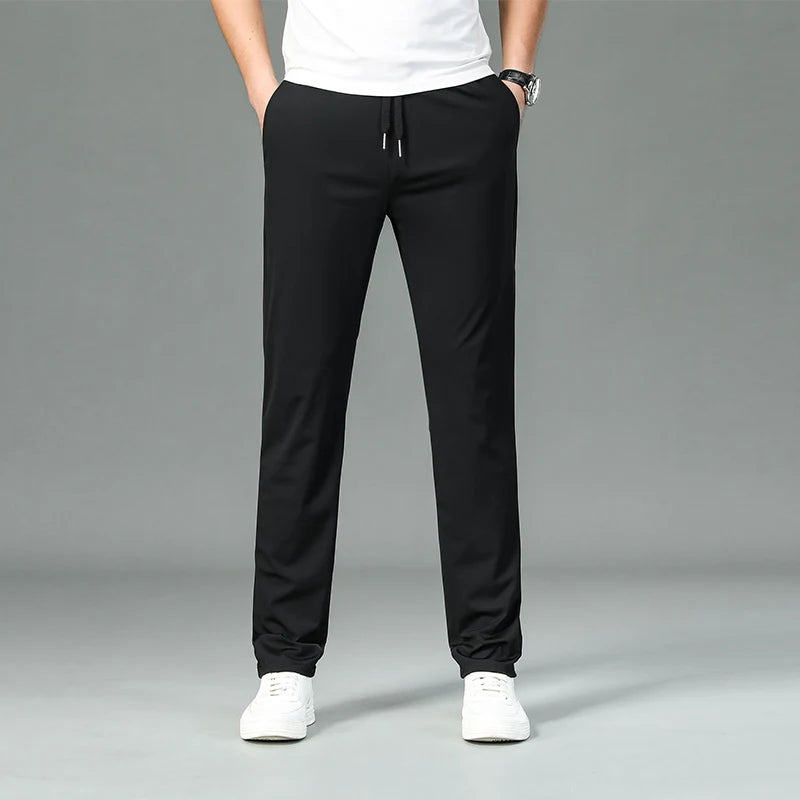 High Quality Ice Silk Stretch New Brand Casual Fashion Strappy Long Pants Elastic Pencil Street Style Teens Trousers Men Clothes