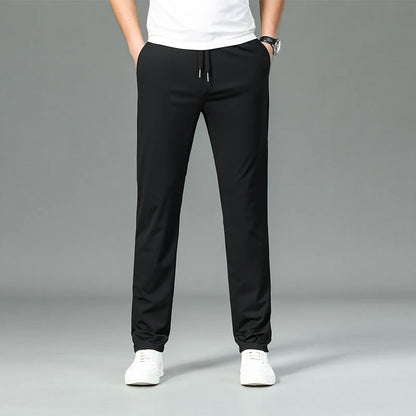 High Quality Ice Silk Stretch New Brand Casual Fashion Strappy Long Pants Elastic Pencil Street Style Teens Trousers Men Clothes